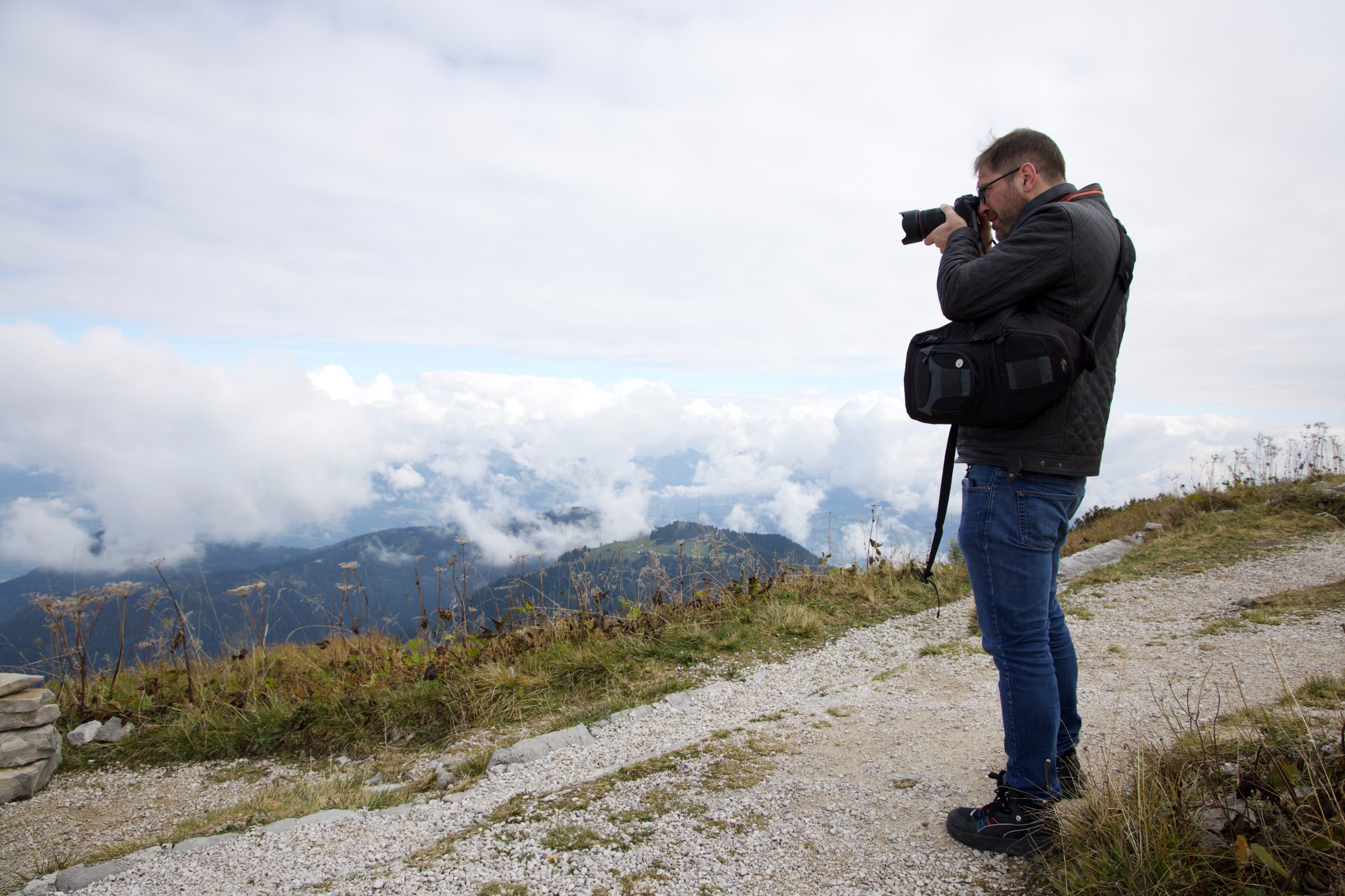 Dominik photographing in the Alps